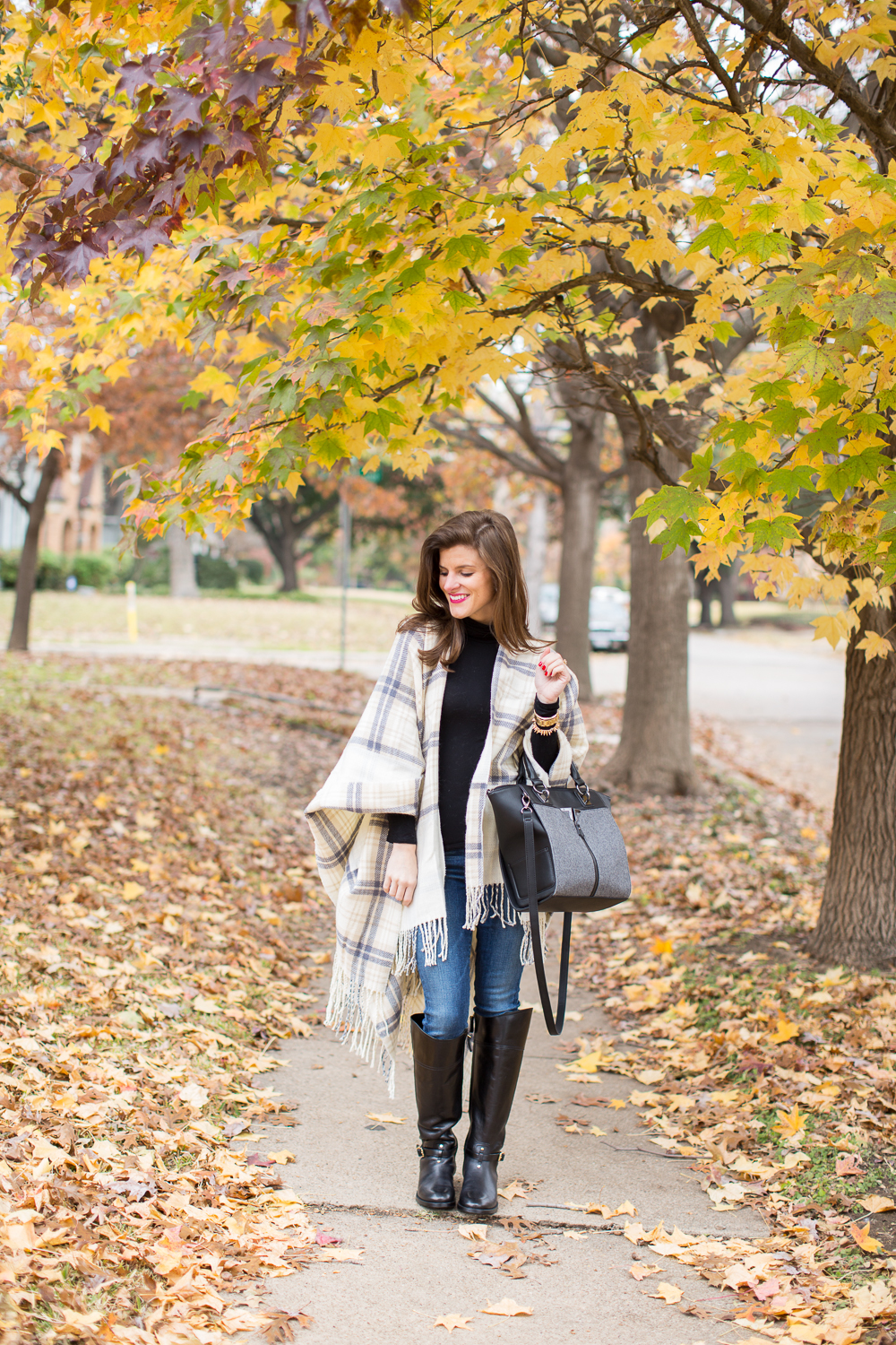plaid cape with riding boots