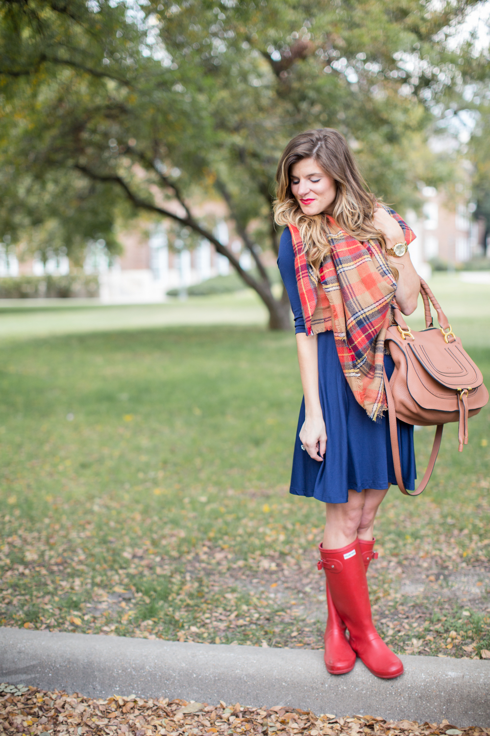navy swing dress and blanket scarf and hunter boots rainy day outfit