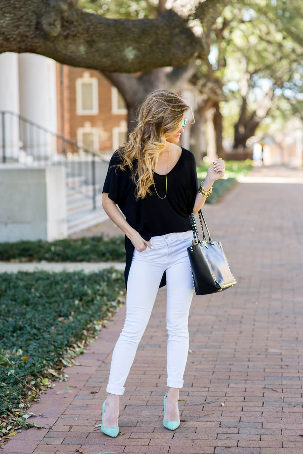 black t shirt with white jeans