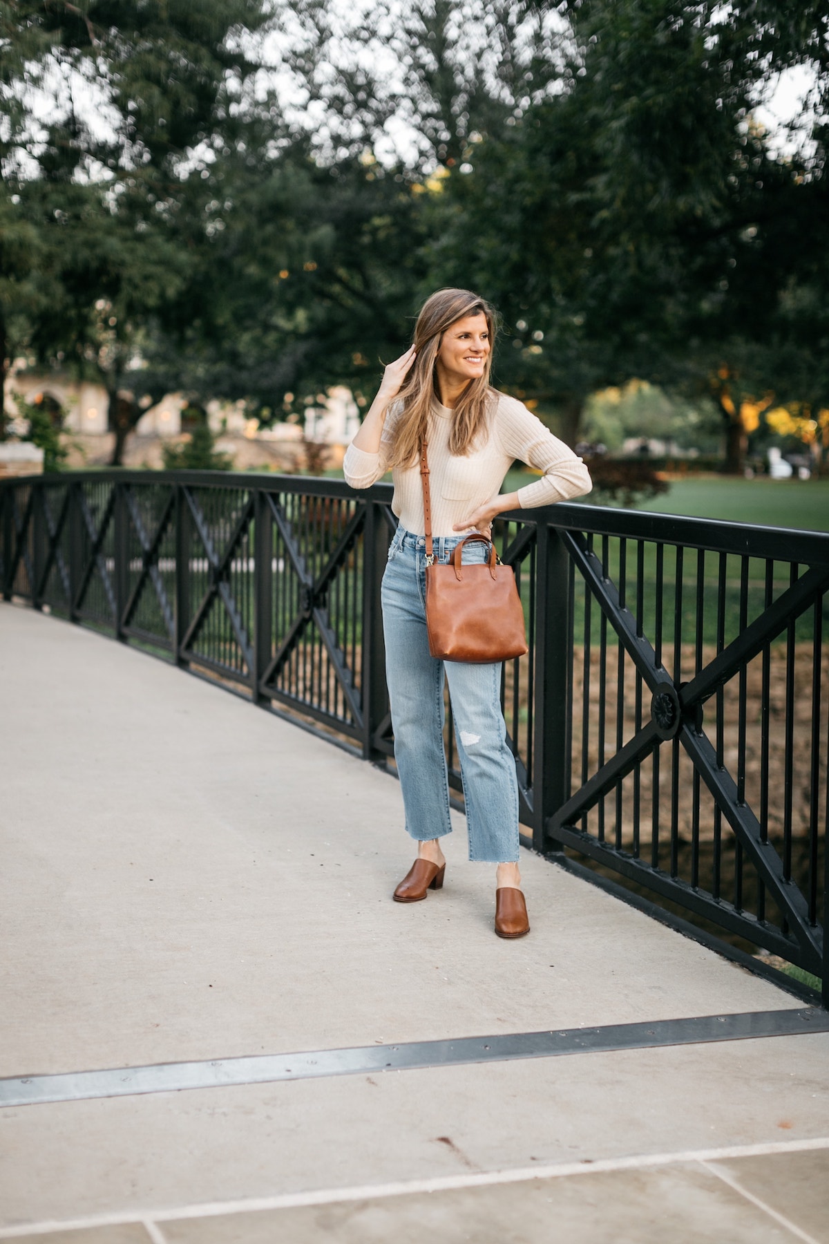 Brighton Butler transitional look, Levi's ribcage denim wide leg, mules, cream sweater, simple transitional outfit 