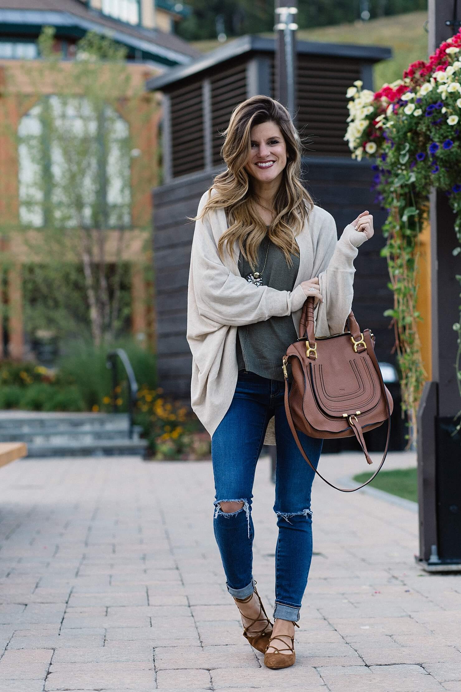 casual fall outfit idea, olive sweater and jeans, distressed jeans rolled up with lace up flats, jeans and flats outfit, pinterest fashion, oversized sweater and skinny jeans outfit, olive green sweater, cognac suede lace up flats