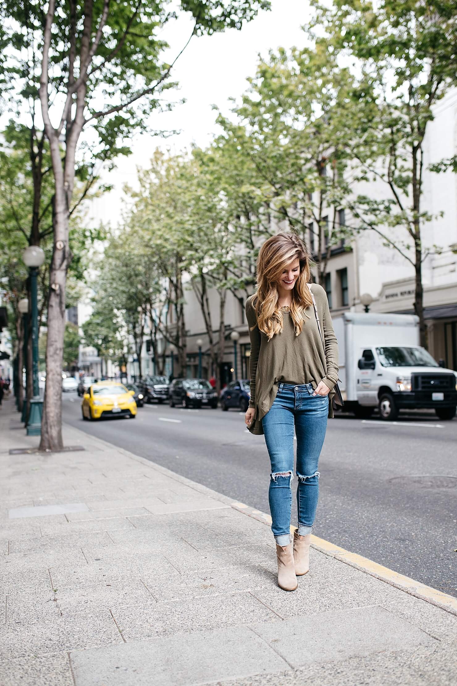 simple fall outfit idea, olive green long sleeve waffle tee, casual fall outfit, long sleeved tee and jeans, booties outfit, ankle booties look, fall simple outfit, jeans an booties, chloe faye handbag