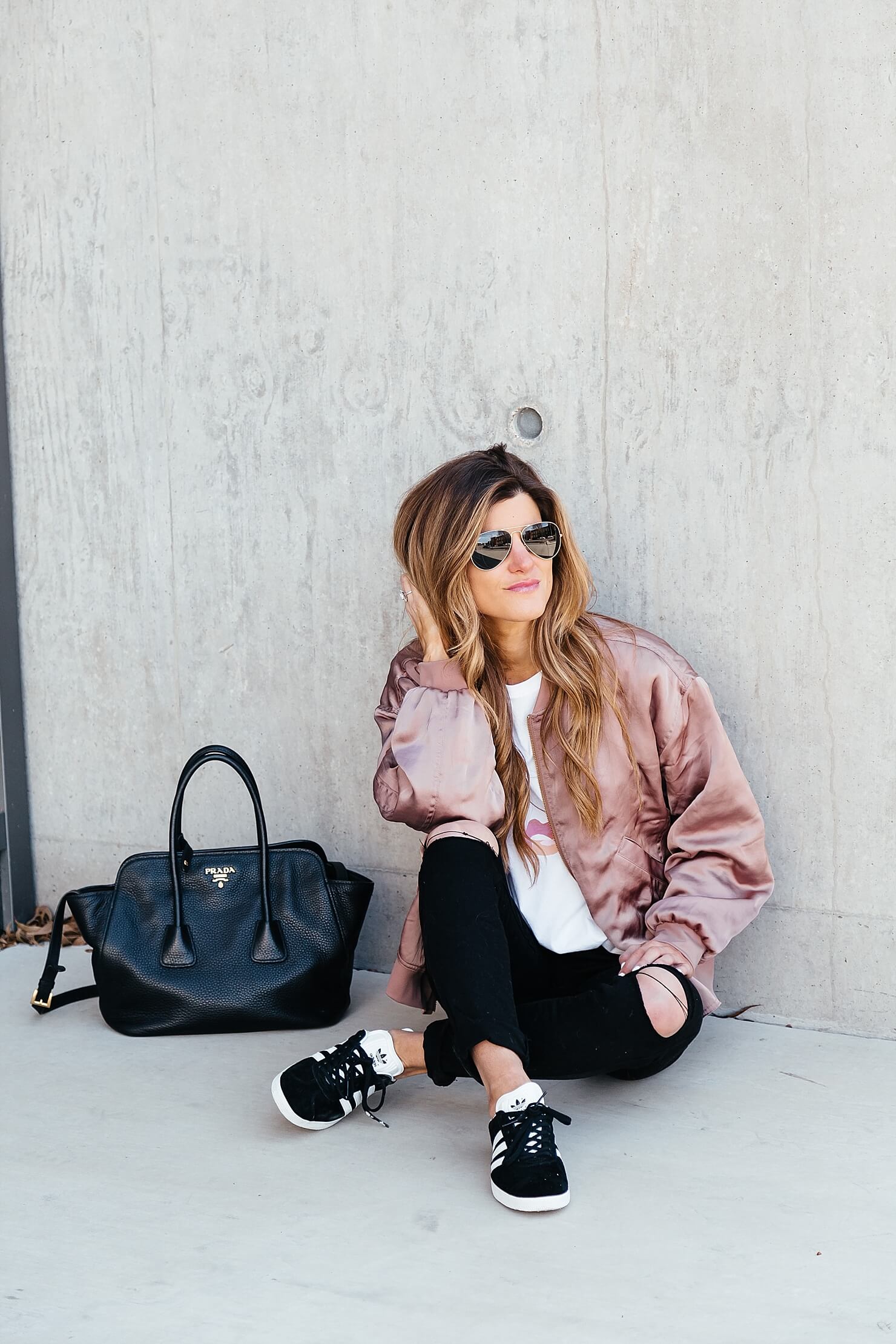 sincerely jules lips and lashes tee, leith pink bomber jacket, black jeans, casual everyday outfit, adidas gazelle sneakers