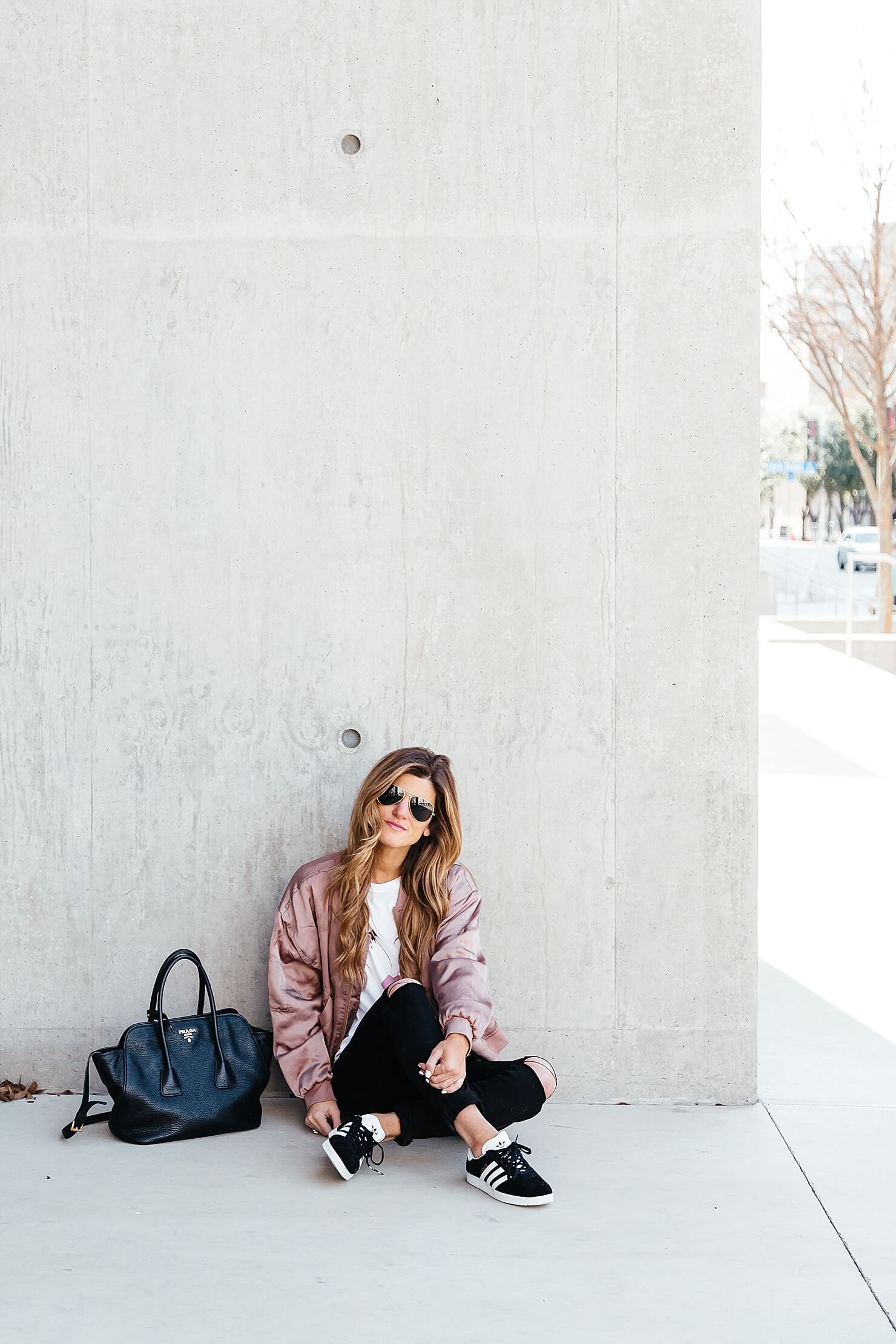 sincerely jules lips and lashes tee, leith pink bomber jacket, black jeans, casual everyday outfit, adidas gazelle sneakers