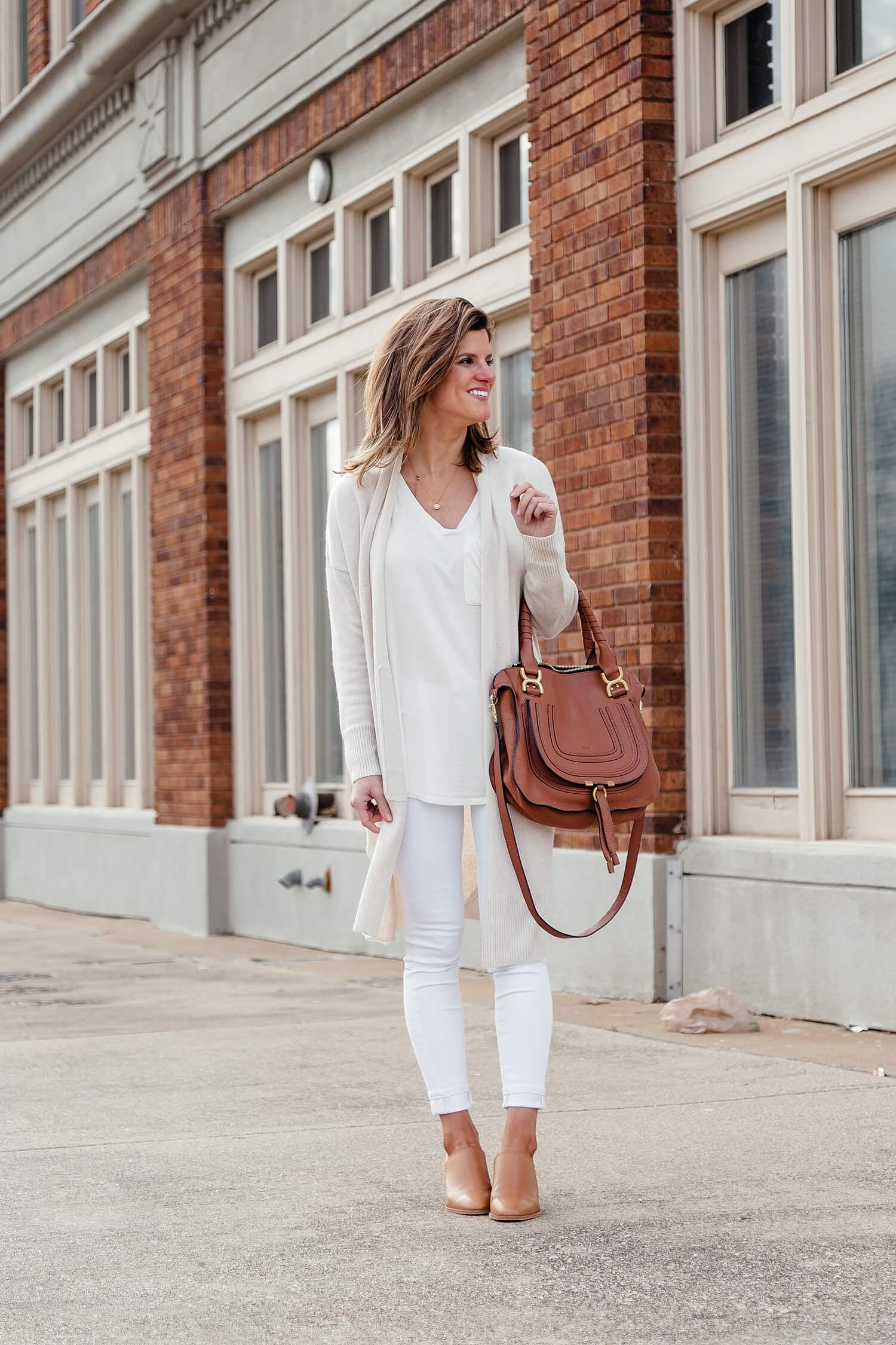 spring neutrals outfit with white jeans and cream cardigan