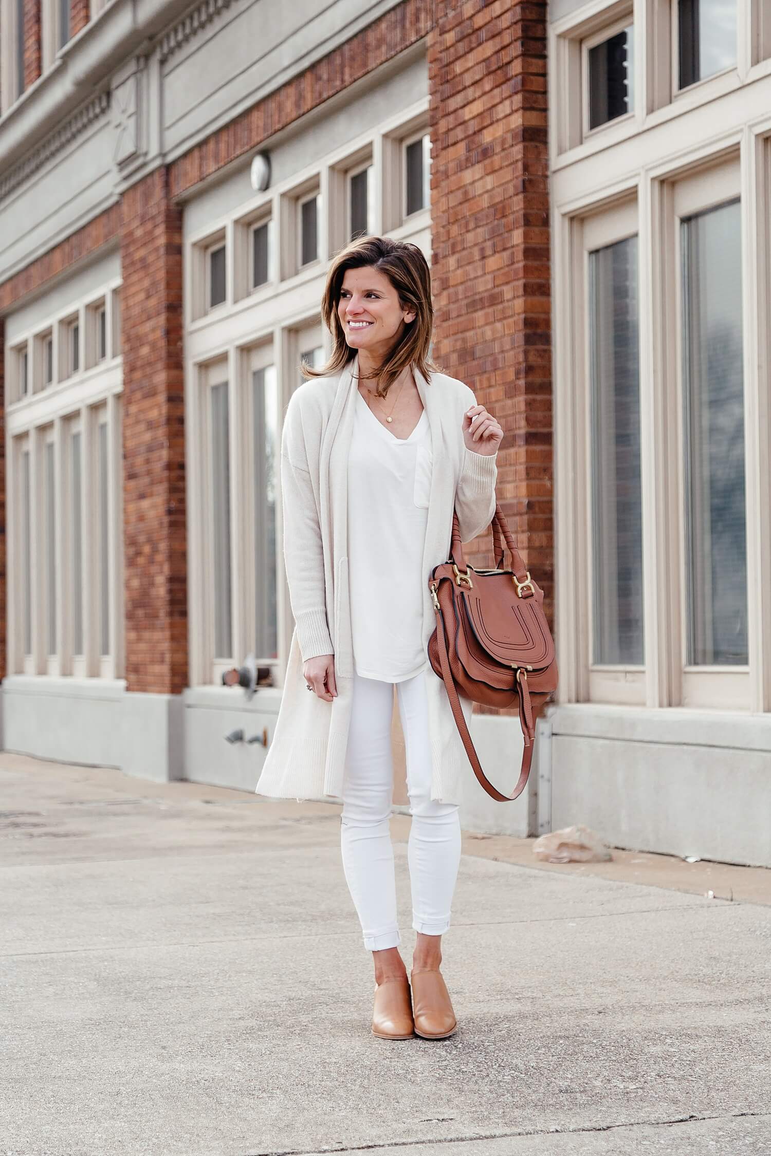 spring neutrals outfit with white jeans and cream cardigan