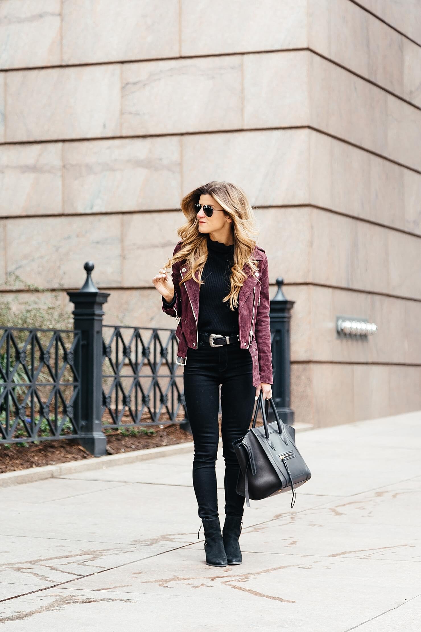 all black outfit, black booties, burgundy suede moto jacket, celine phantom tote