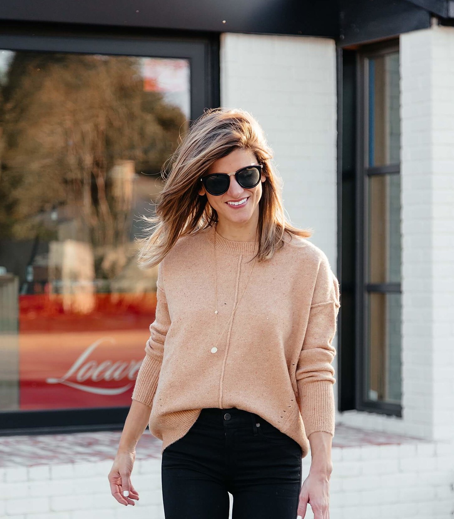 camel sweater, black jeans, leopard booties, brown leather bag, and black sunglasses