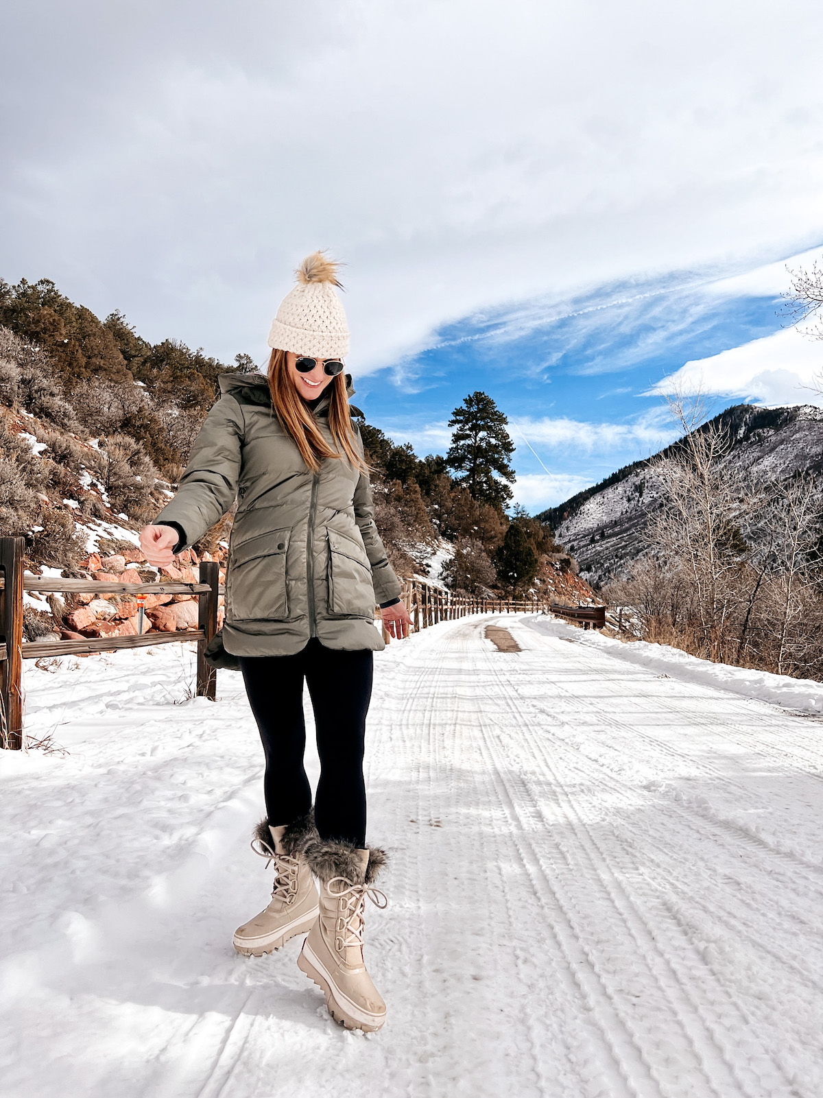 Backcountry green parka and beyond yoga leggings with sorel boots