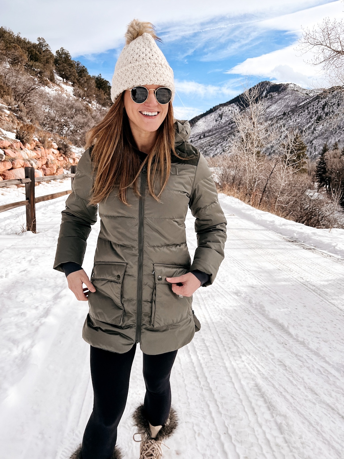 Backcountry green parka and beyond yoga leggings with sorel boots