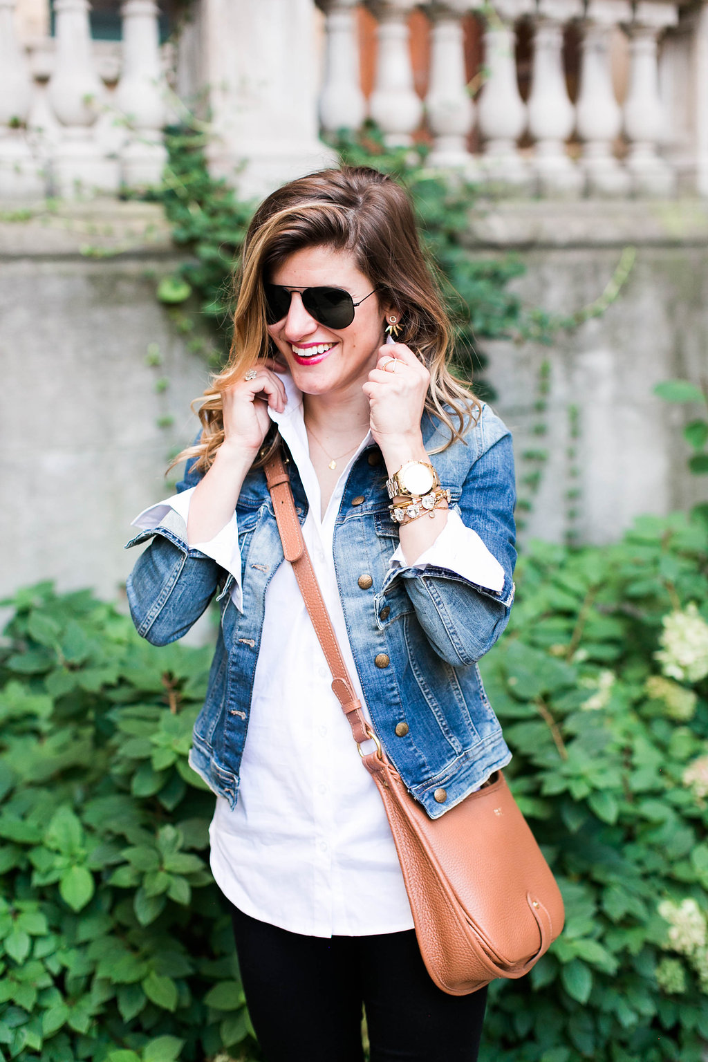 what to wear with a jean jacket, denim jacket and white button down and brown leather crossbody and leopard pointed toe heels