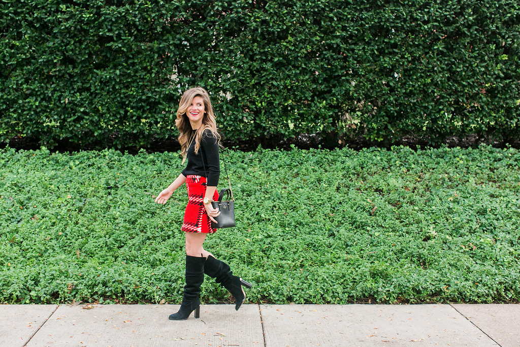 Red black plaid mini skirt with black sweater holiday outfit