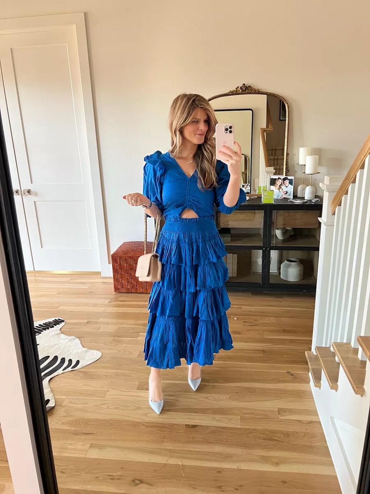 Brighton Butler wearing Sea blue ruffle dress shopbop