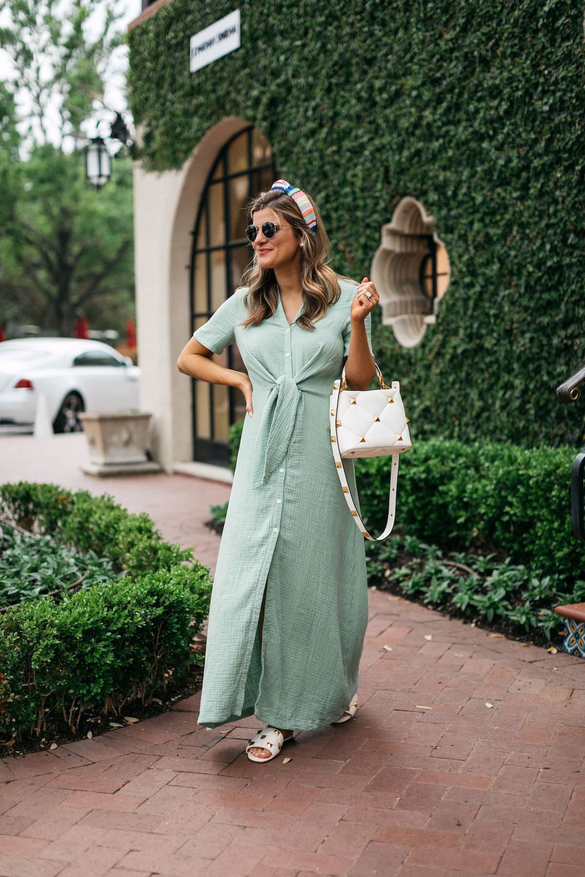 Brighton Butler wearing caslon green maxi dress with rainbow headband