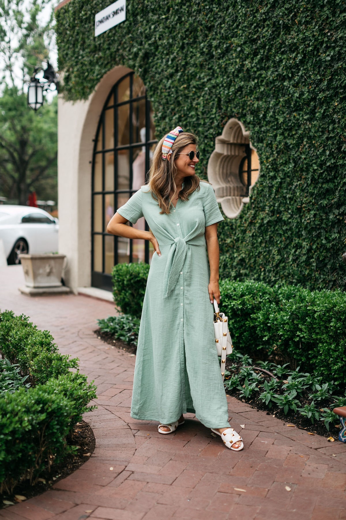 Brighton Butler wearing caslon green maxi dress with rainbow headband