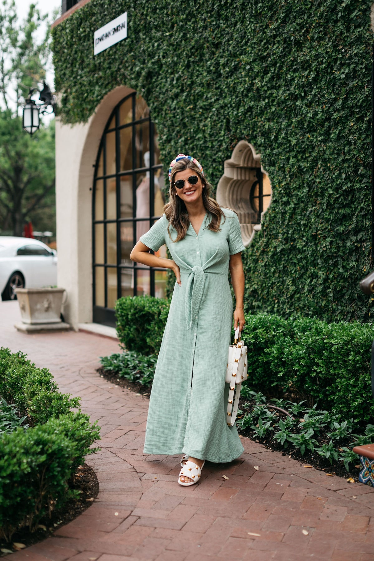 Brighton Butler wearing caslon green maxi dress with rainbow headband