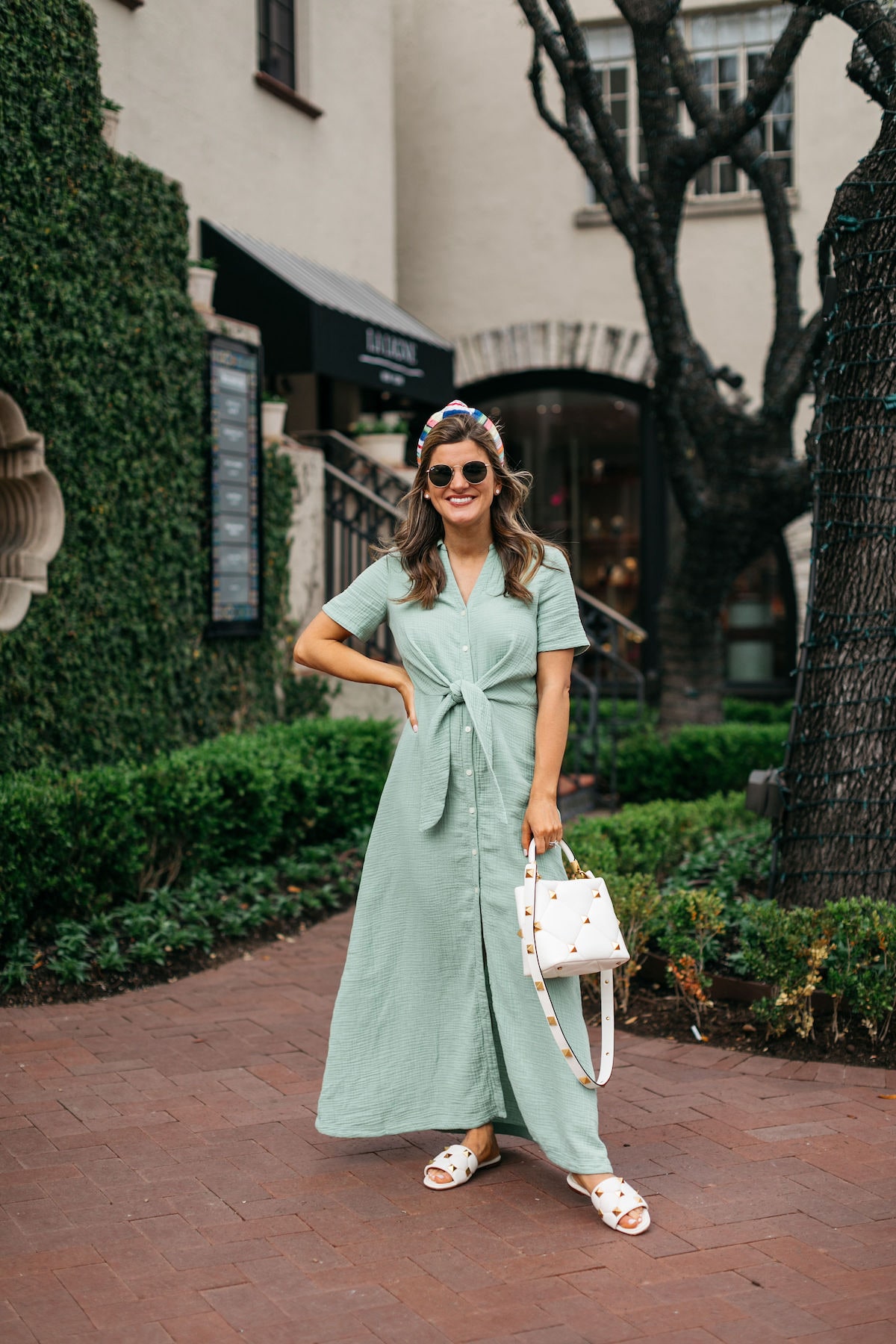 Brighton Butler wearing caslon green maxi dress with rainbow headband