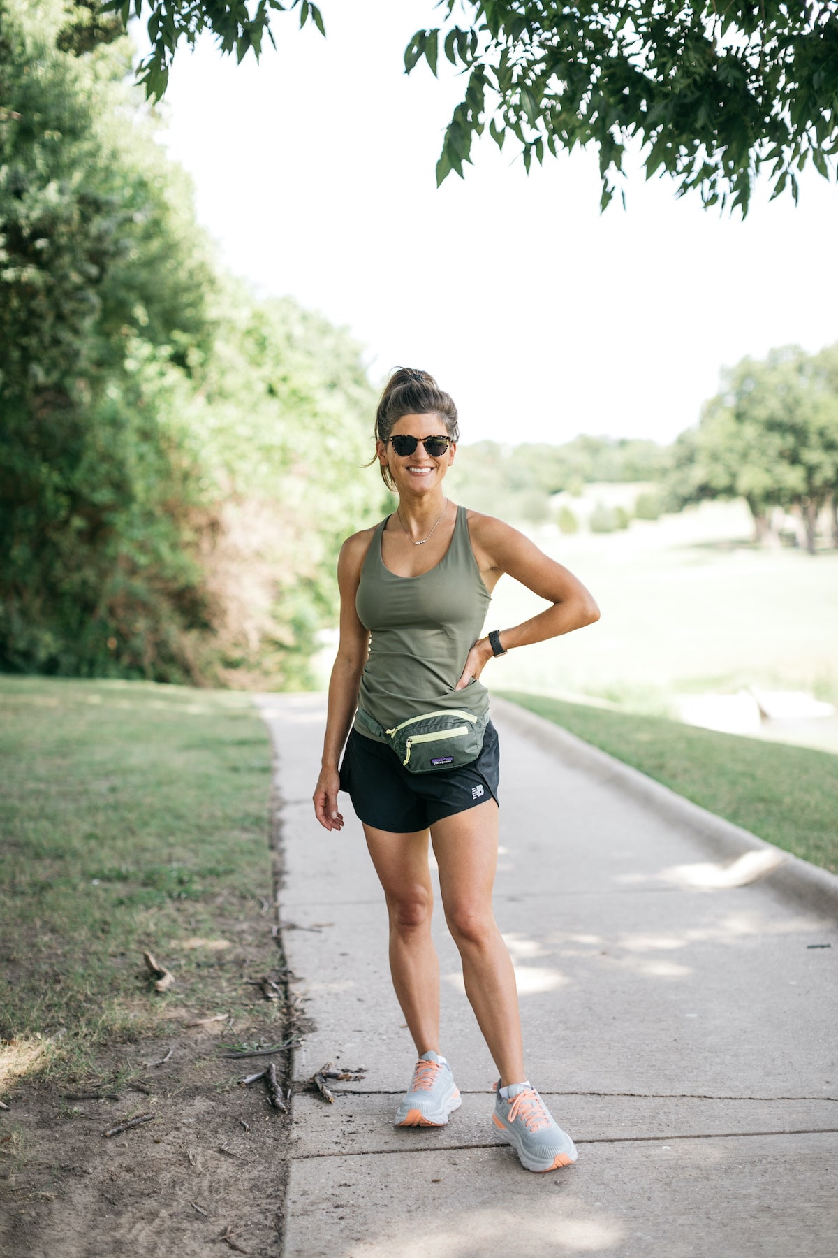 Brighton Butler wearing green tank for Backcountry