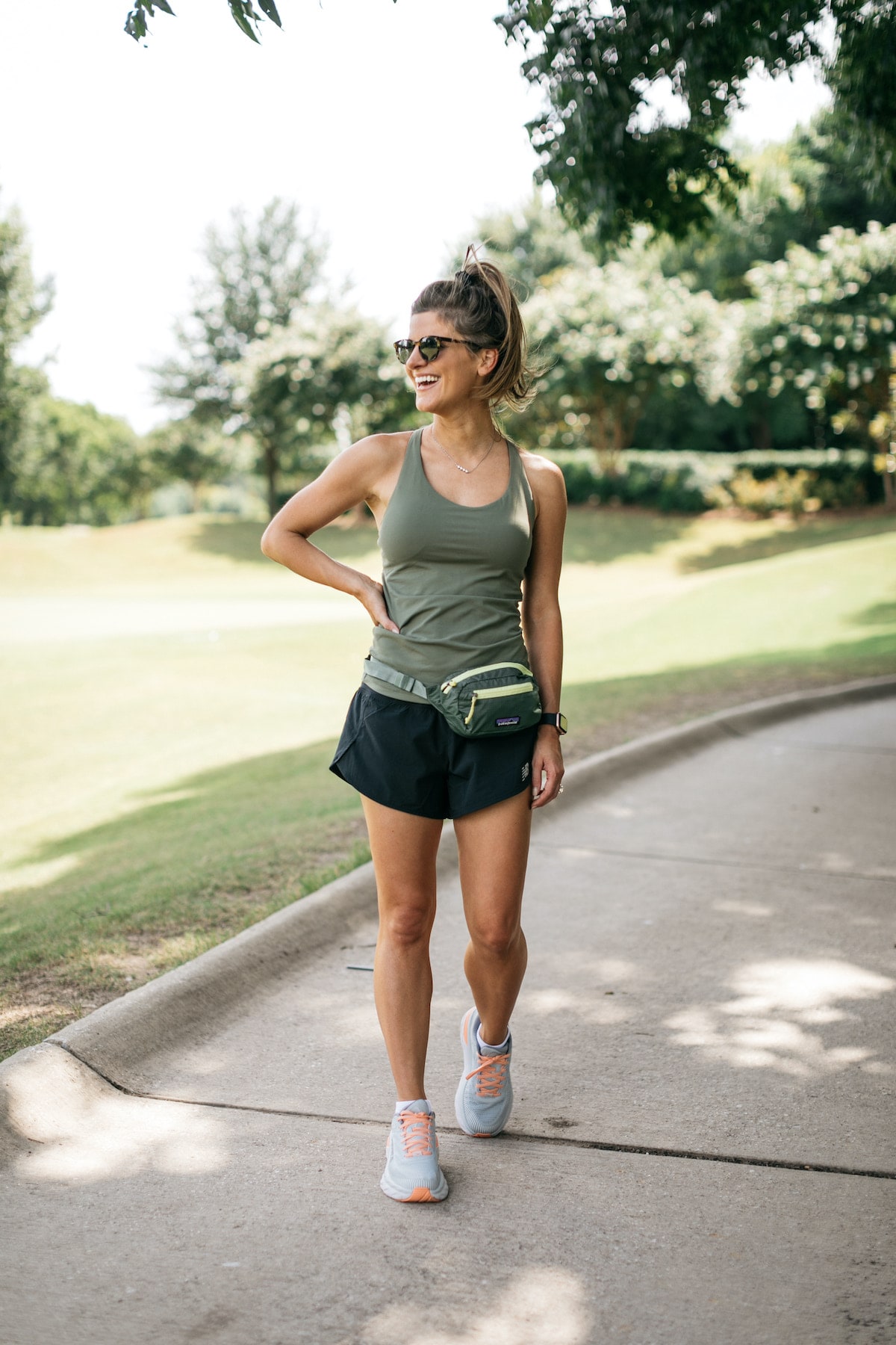 Brighton Butler wearing green tank for Backcountry