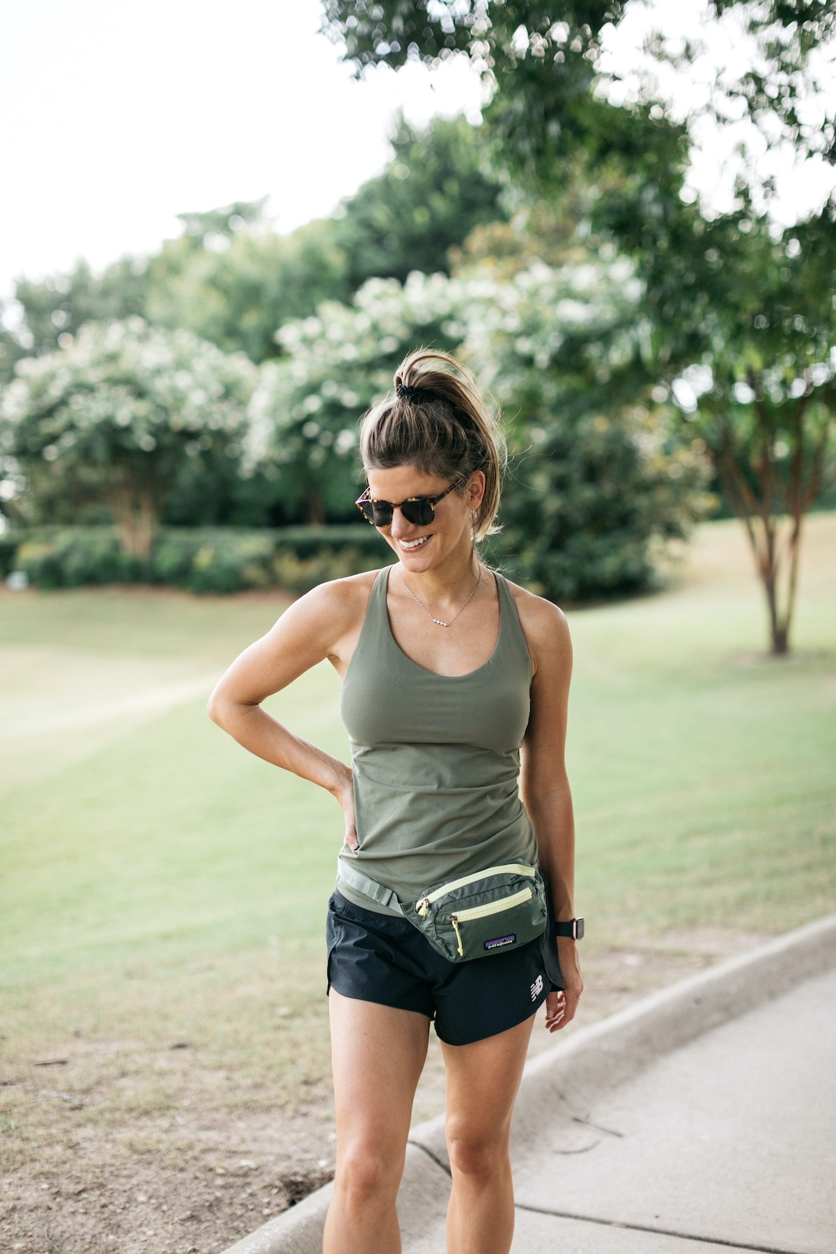 Brighton Butler wearing green tank for Backcountry