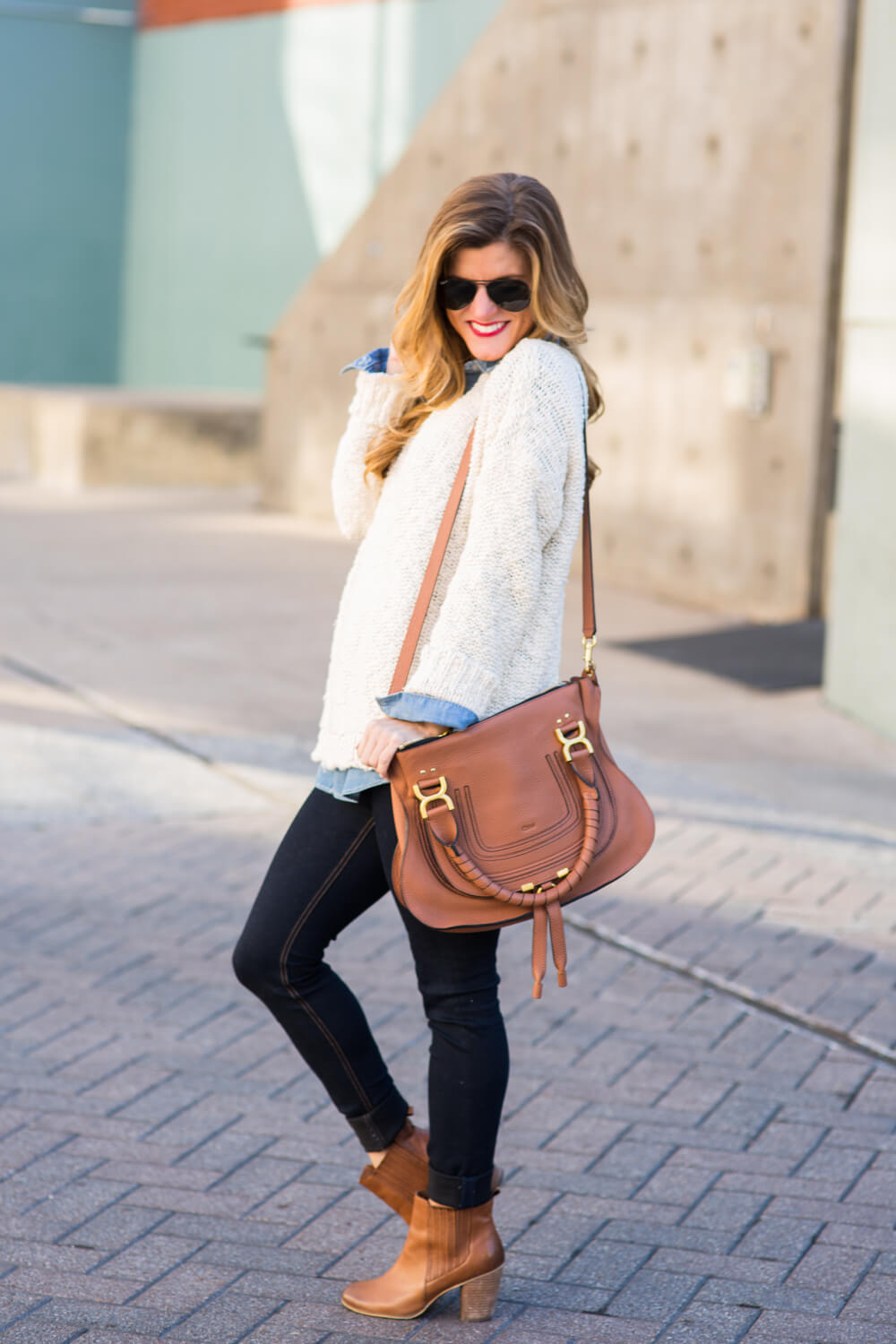 oversized sweater + denim shirt + skinny jeans + booties