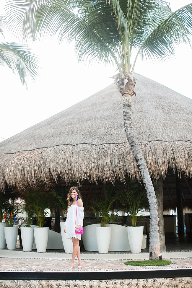 brightontheday wearing white off the shoulder dress at azul beach resort