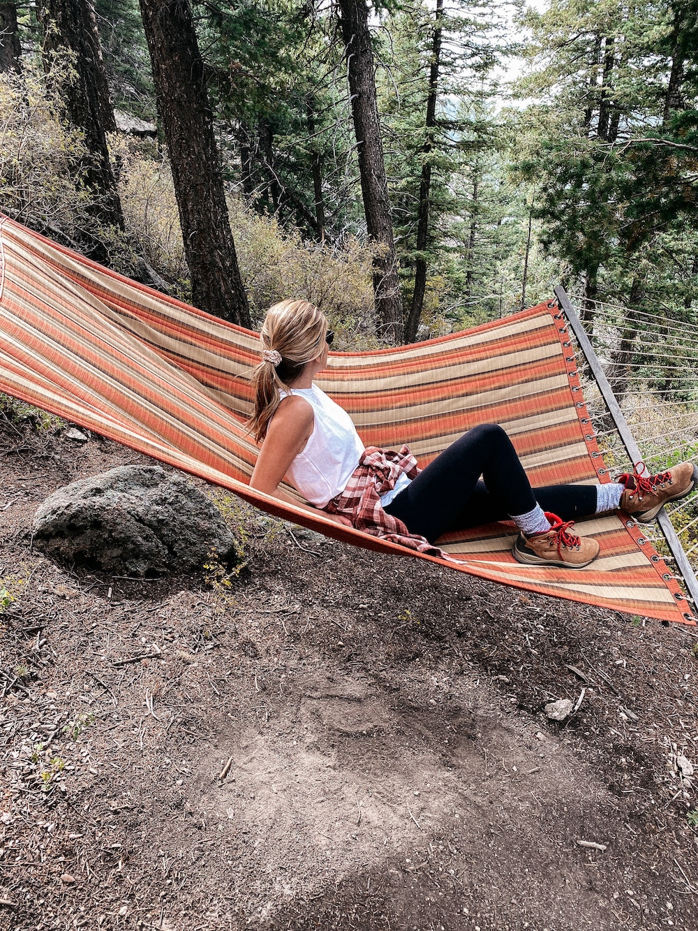 brighton butler at qroadmoor cloud camp sitting on hammock