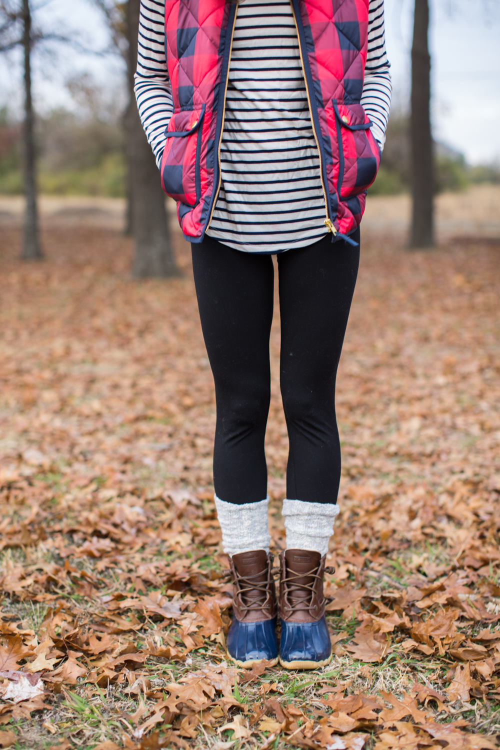 fall outfit idea, duck boots, buffalo plaid puffer vest, stripe turtleneck, fall layers