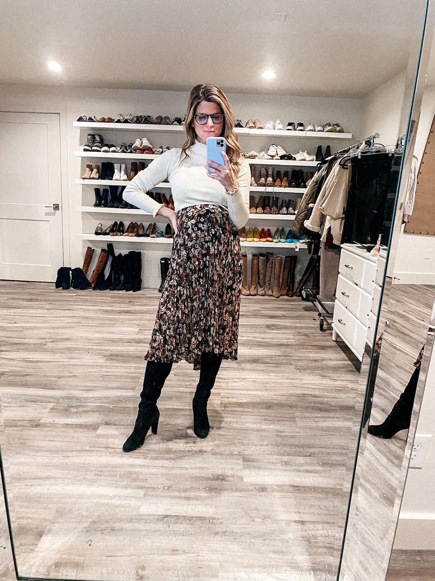 Brighton Butler wearing Abercrombie midi skirt and tan mock neck sweater from express