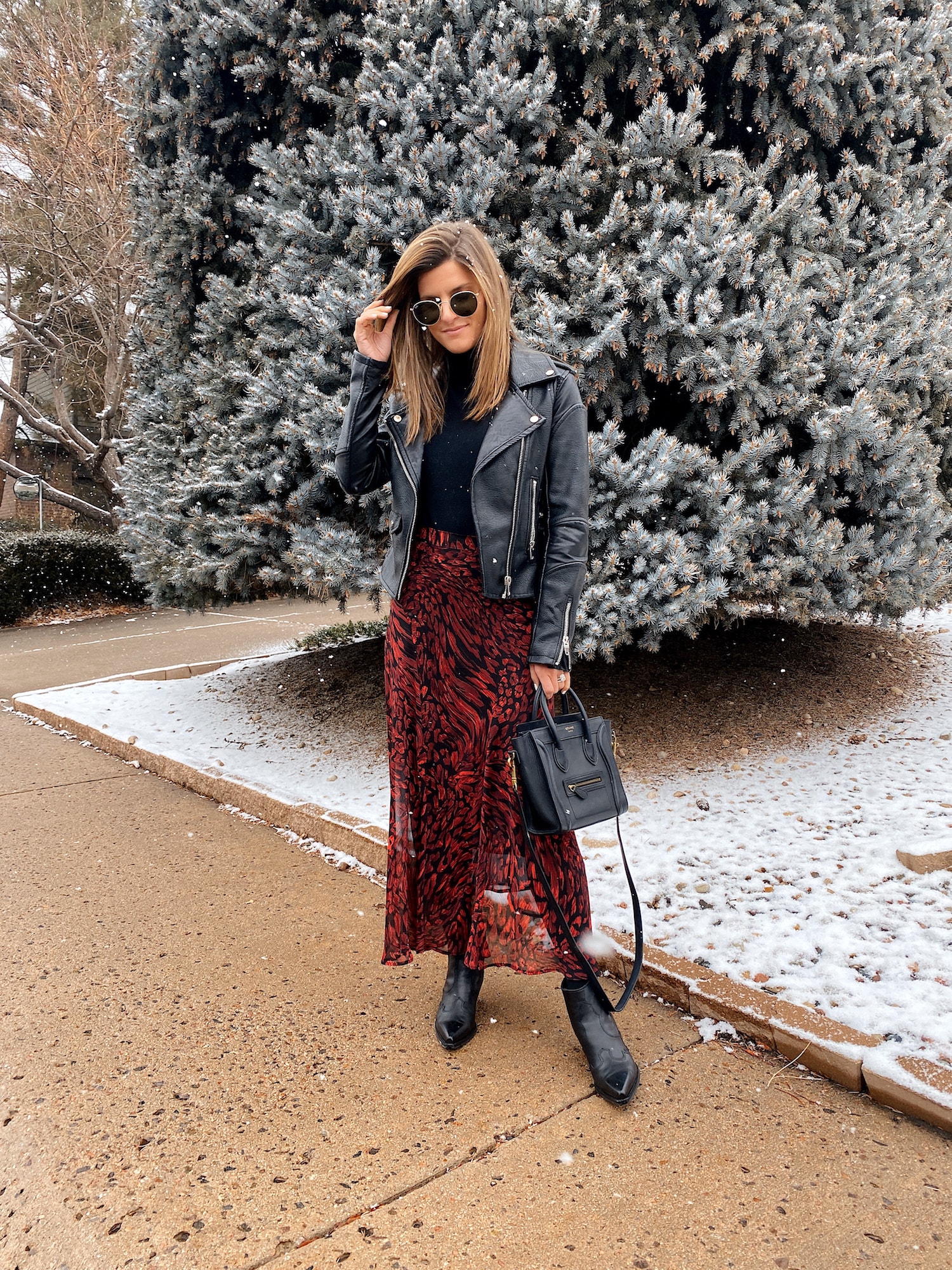 winter outfit, midi skirt, black booties, black tights, moto jacket, black turtleneck