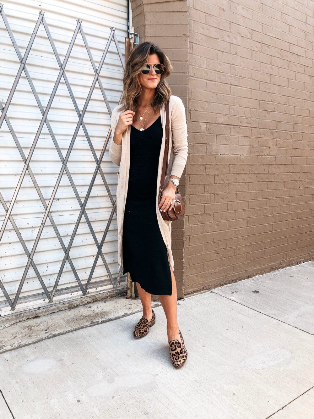 brighton keller wearing fall basics black dress leopard loafers tan cardigan