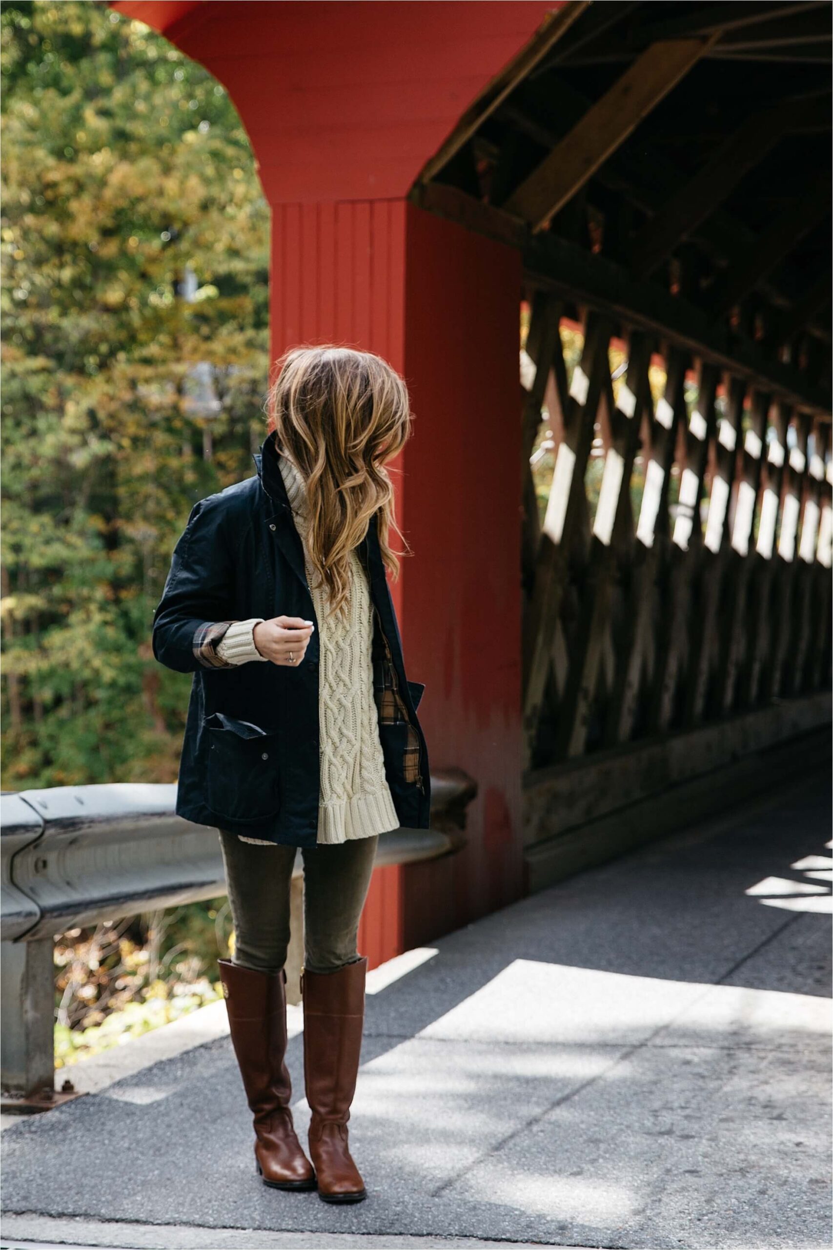 Fall outfit, tory burch riding boots, barbour jacket, olive green pants, oversized cableknit turtleneck sweater covered bridge in Vermont