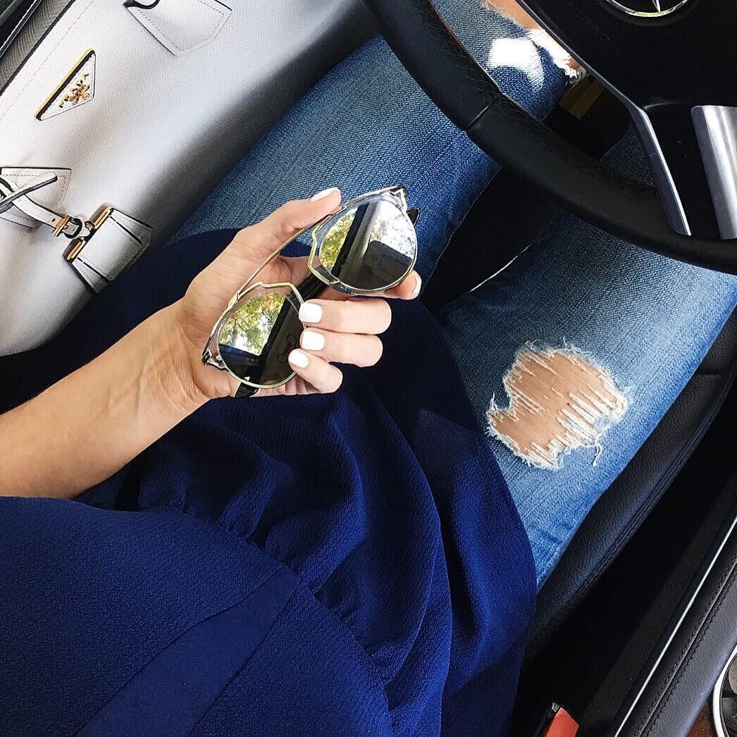 manicure car selfie ripped jeans