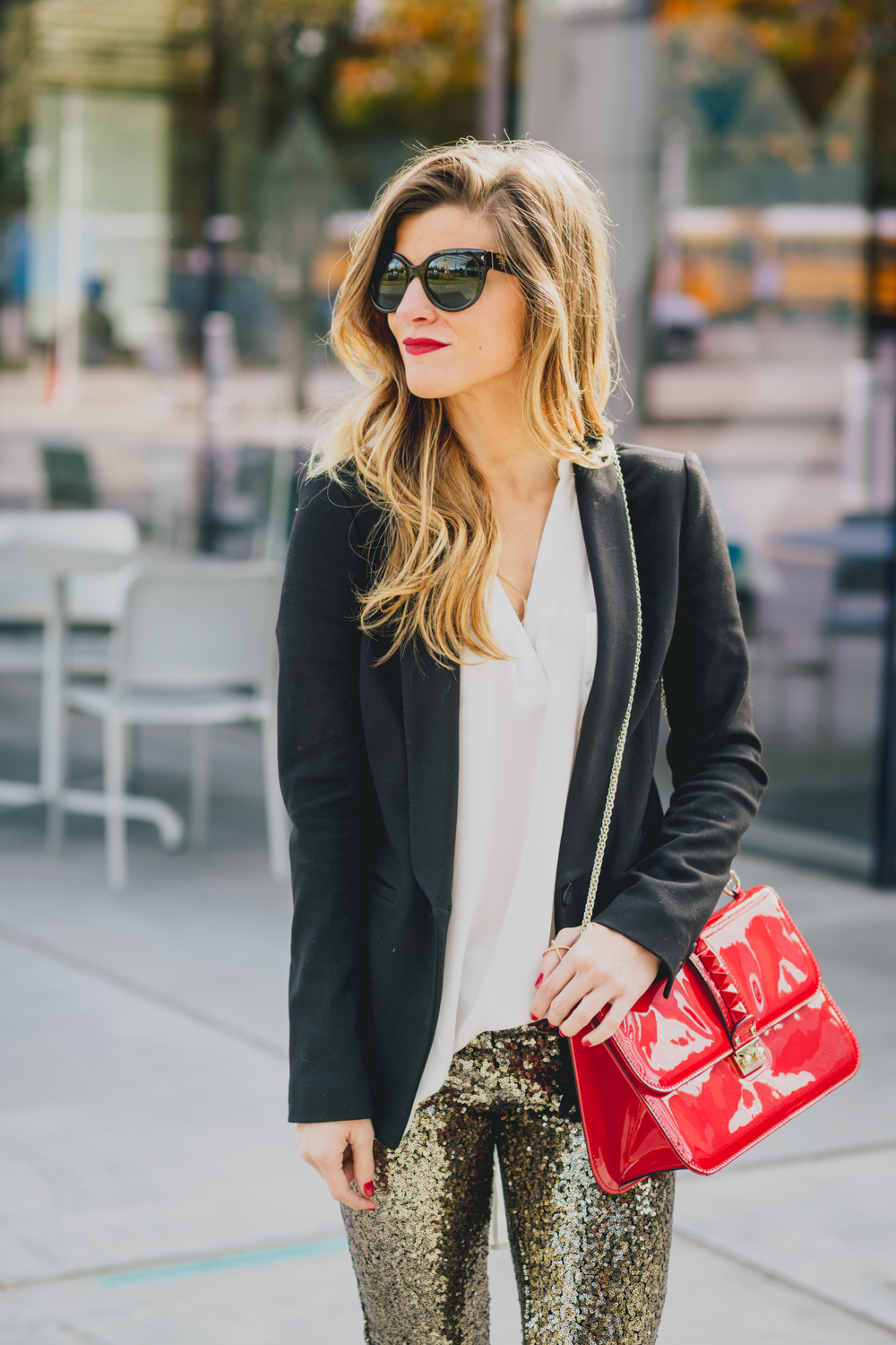 holiday outfit with gold sequin pants, white tunic blouse, black boyfriend blazer, stila lip stain in fiery