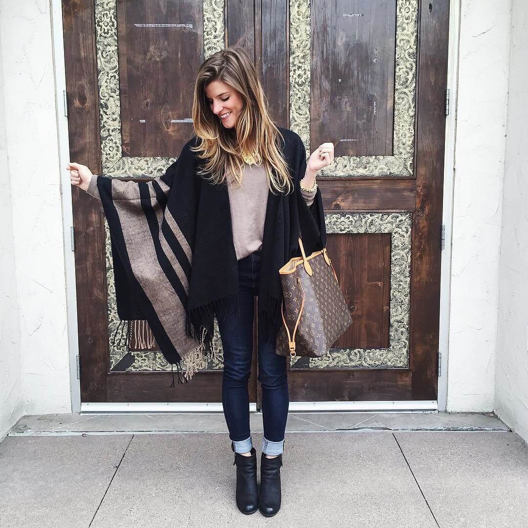 black cape casual outfit, tan swater, rolled up jeans, ankle booties brightonkeller brightontheday