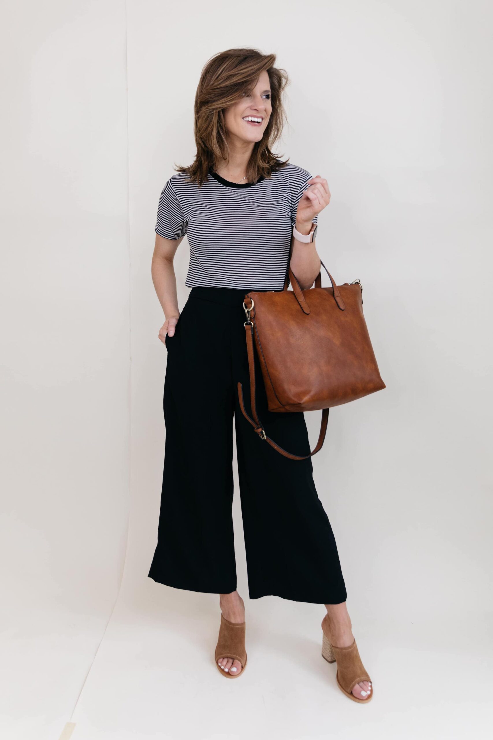 black cropped, striped top, brown bag, mules