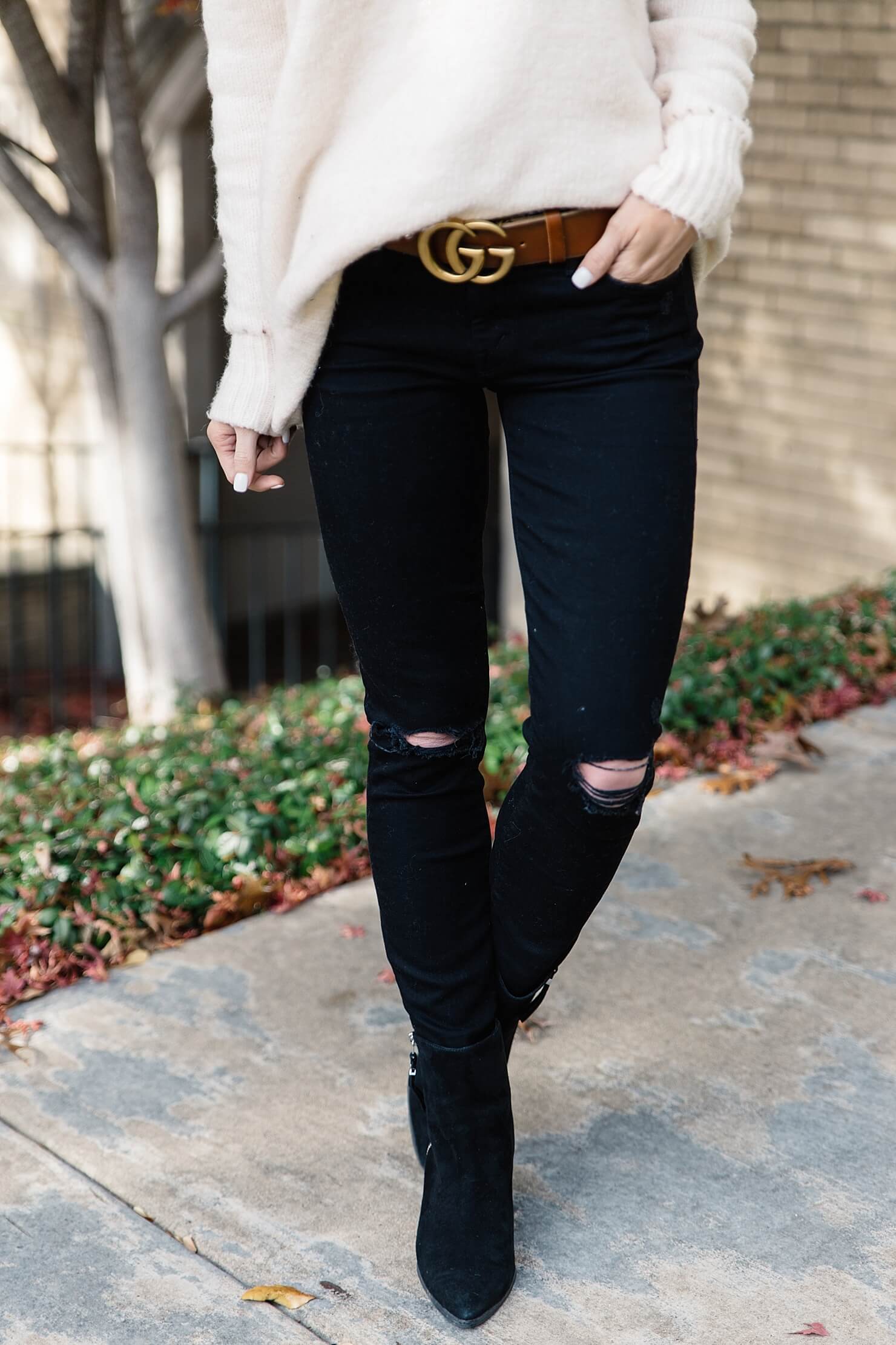 statement belt trend to try gucci brown logo belt, black jeans and black booties, brown belt with black jeans, oversized sweater with skinny jeans, casual fall outfit