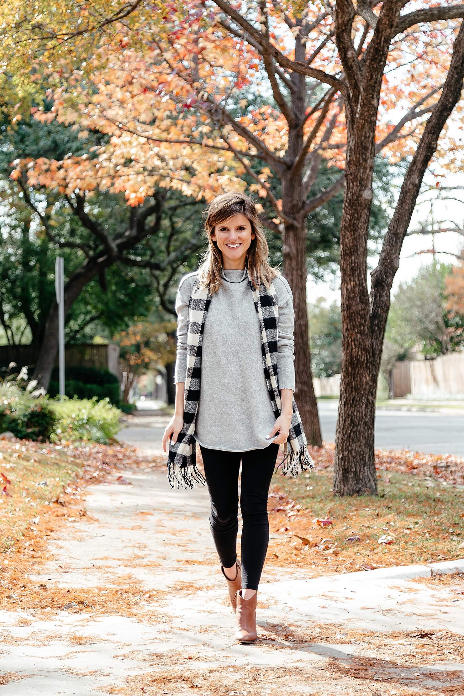 black leggings outfit with grey tunic, scarf, brown booties 15