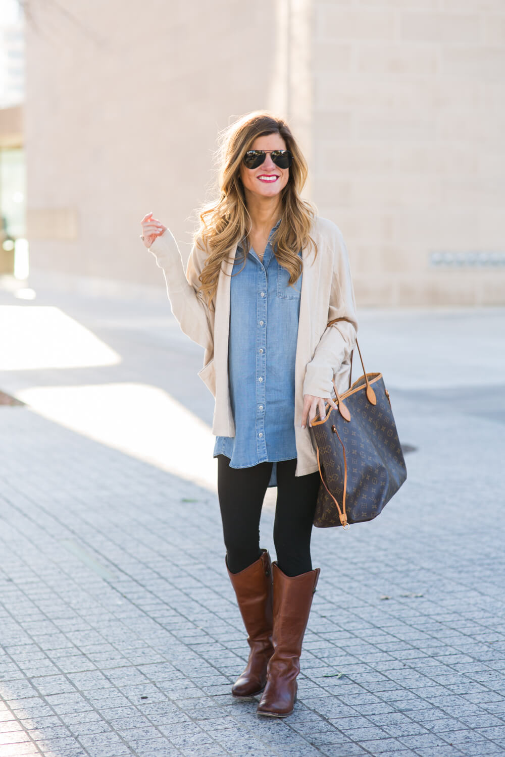 denim shirt + cardigan + riding boots + neverfull tote 