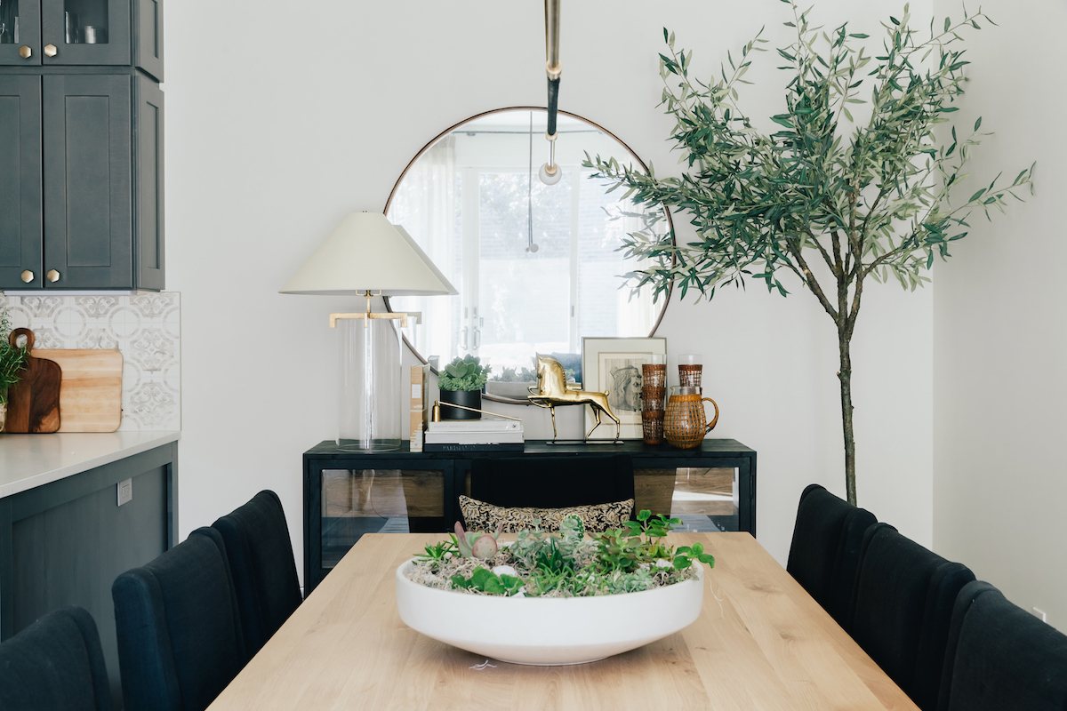 brighton butler dining room, black sideboard with circle mirror, Ralph Lauren lamp, olive tree, sideboard styling