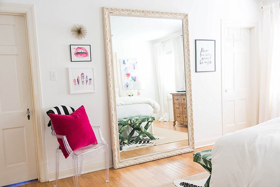 brighton keller bedroom oversizeed mirror and mini gallery wall