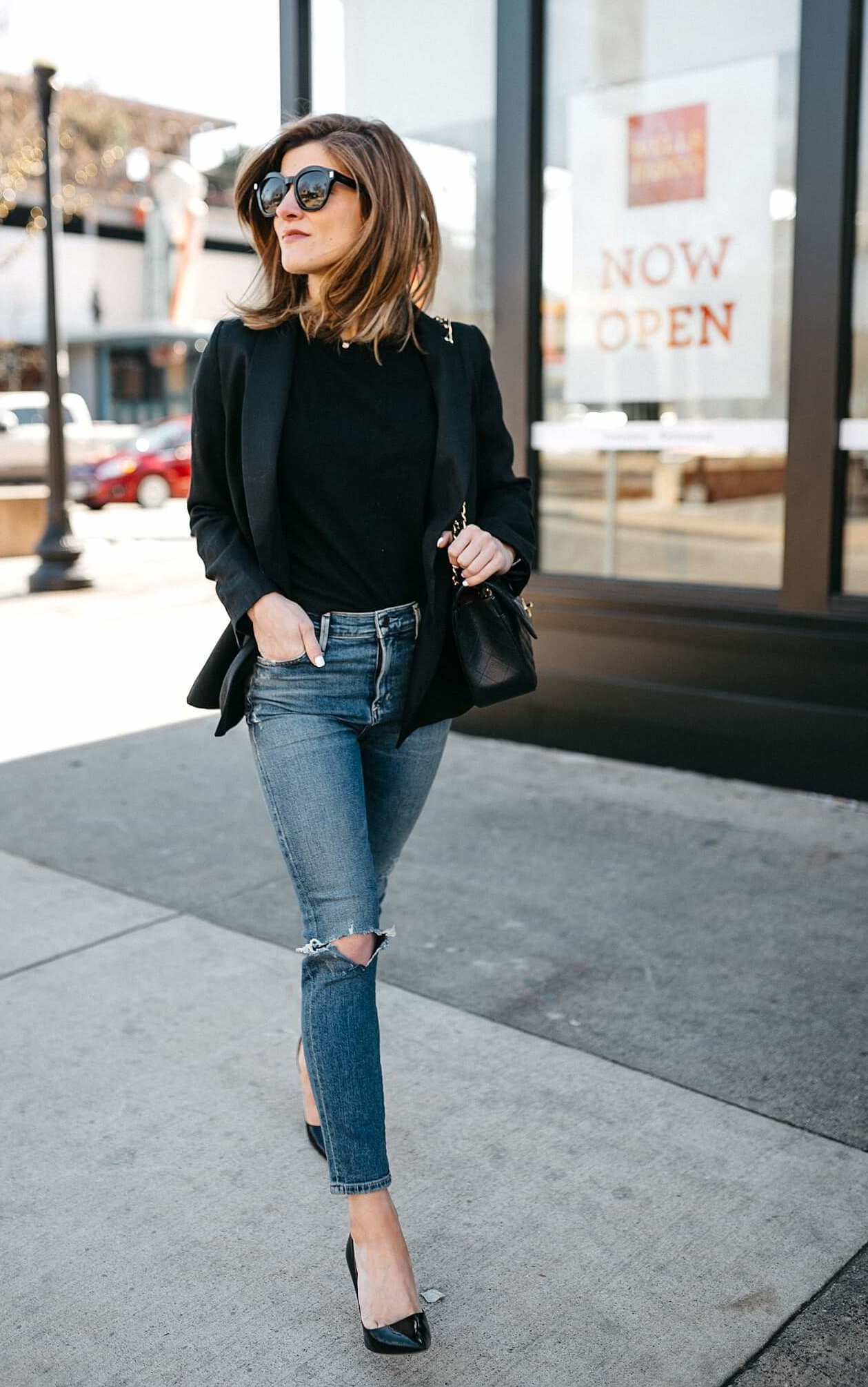 brighton keller wearing black blazer with jeans