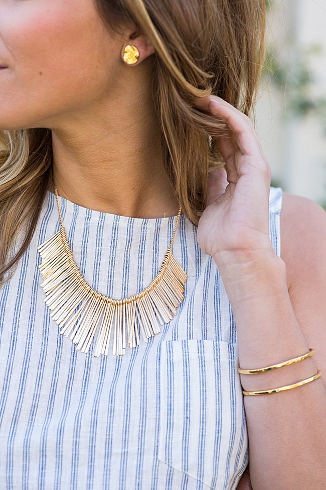 brightontheday detail shot of gold statement necklace and gold stud earrings 3