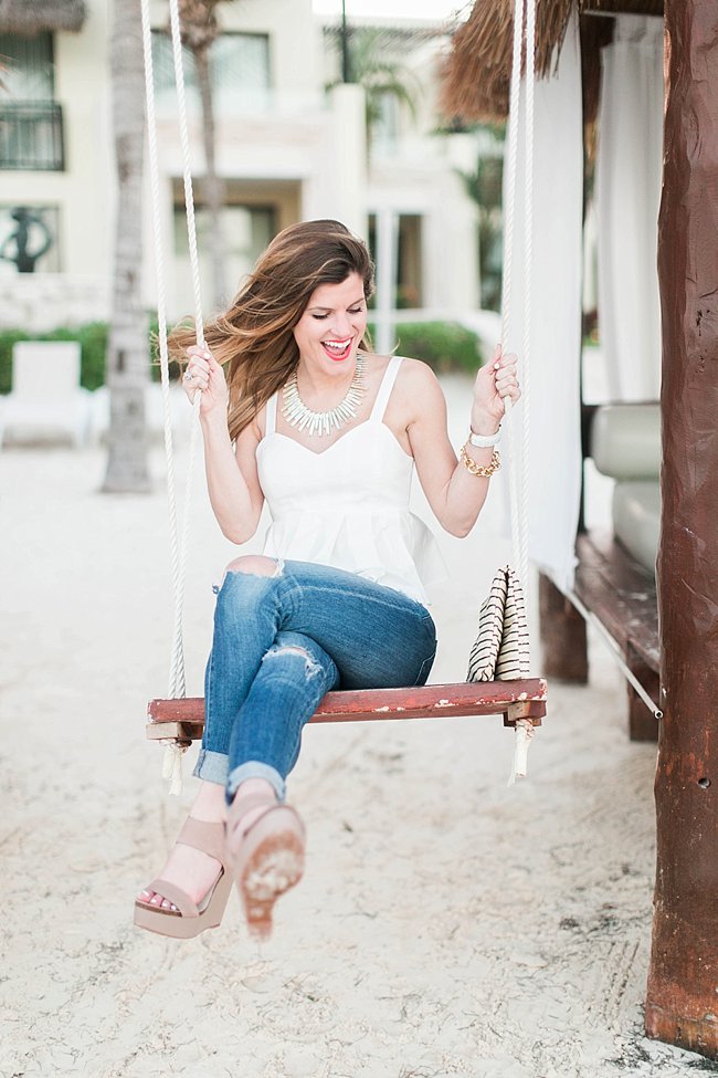 brightontheday swinging in white peplum top distressed jeans neutral wedges