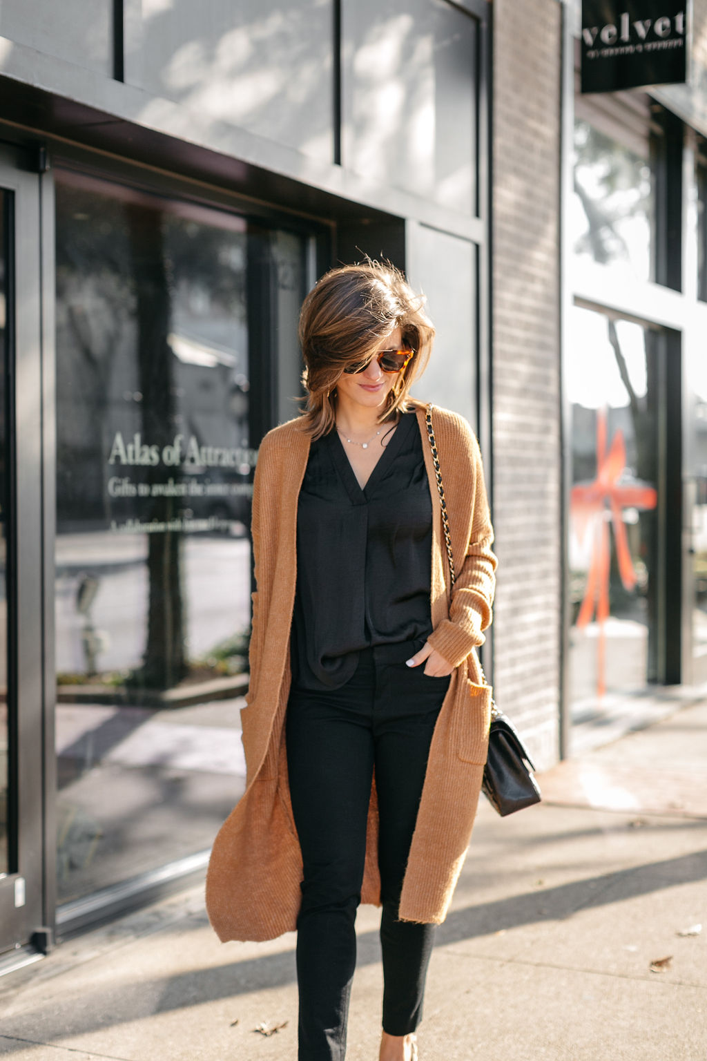 business casual all black outfit long cardigan leopard pumps