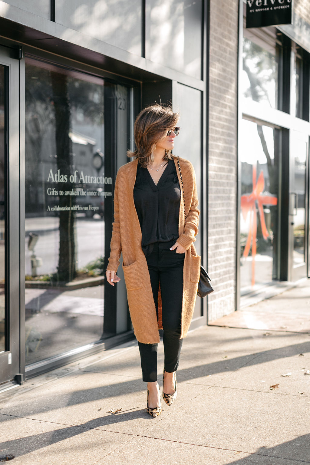 business casual all black outfit long cardigan leopard pumps