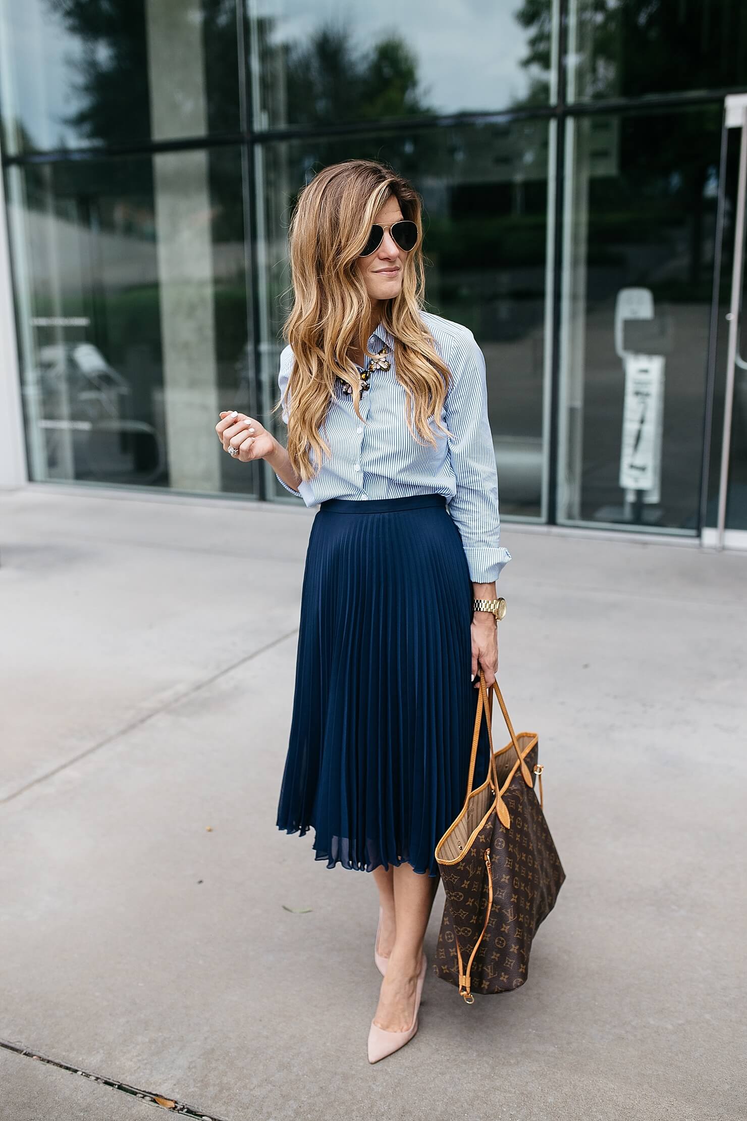 business casual outfit, business professional outfit idea, pleated midi skirt, navy and blush outfit, statement necklace