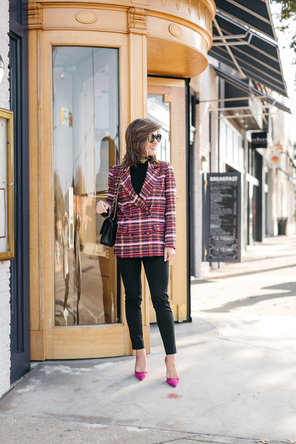 all black outfit plaid blazer hot pink pumps Chanel bag holiday snappy casual look