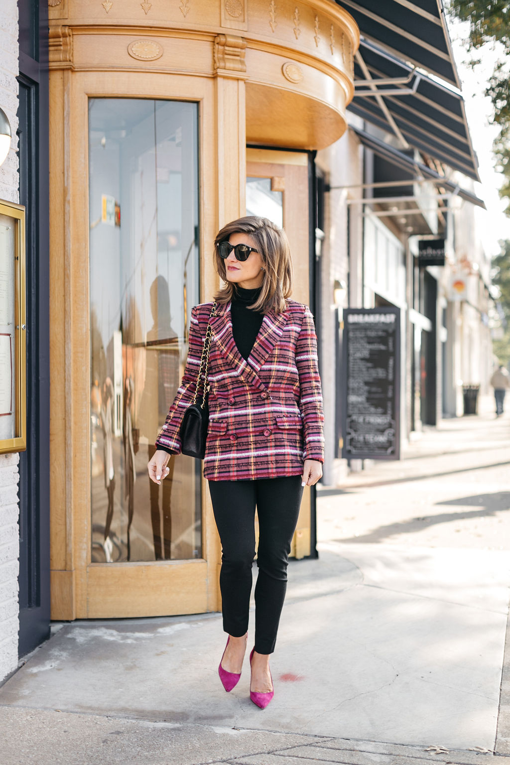 all black outfit plaid blazer hot pink pumps Chanel bag holiday snappy casual look