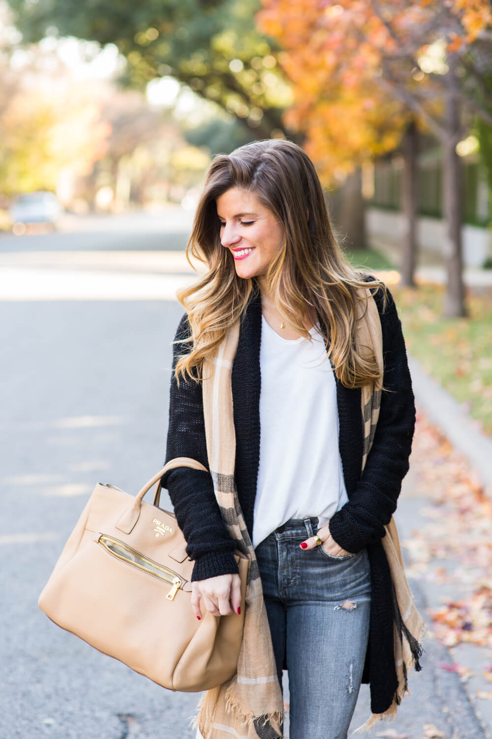 grey jeans, cream sweater, black cardigan, tan scarf casual everyday fall outfit